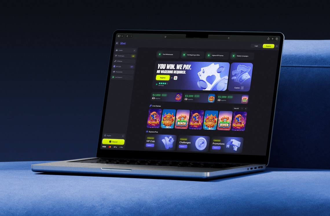 5Bet website shown on a laptop, with promo banners, live games and VIP club